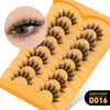 Une boîte d'extensions de cils naturels et fins dans un plateau en plastique jaune, montrant un cil agrandi.