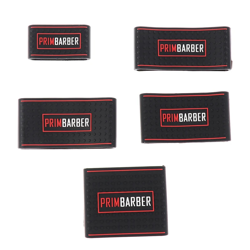 A set of five black silicone anti-slip trimmer grips, each featuring the red PRIMBARBER logo.