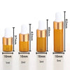 A set of five gold glass dropper bottles with white caps and various liquid volumes labeled 1ml to 5ml.