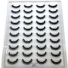 Un plateau en plastique contenant un kit de faux cils de mink naturels.