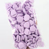 A clear plastic bag filled with purple latex-free finger puffs for makeup application.