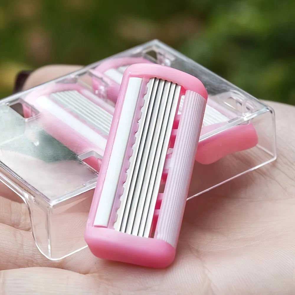 A pink safety razor with six blades is shown resting in a clear plastic case on a person's hand.