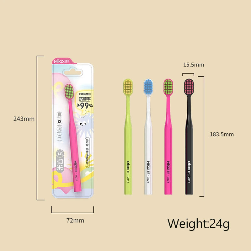 A package of pink and green soft bristle manual toothbrushes with measurements shown.