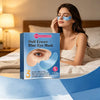 A woman applies a blue eye mask to her eye while relaxing in bed, next to the product packaging.