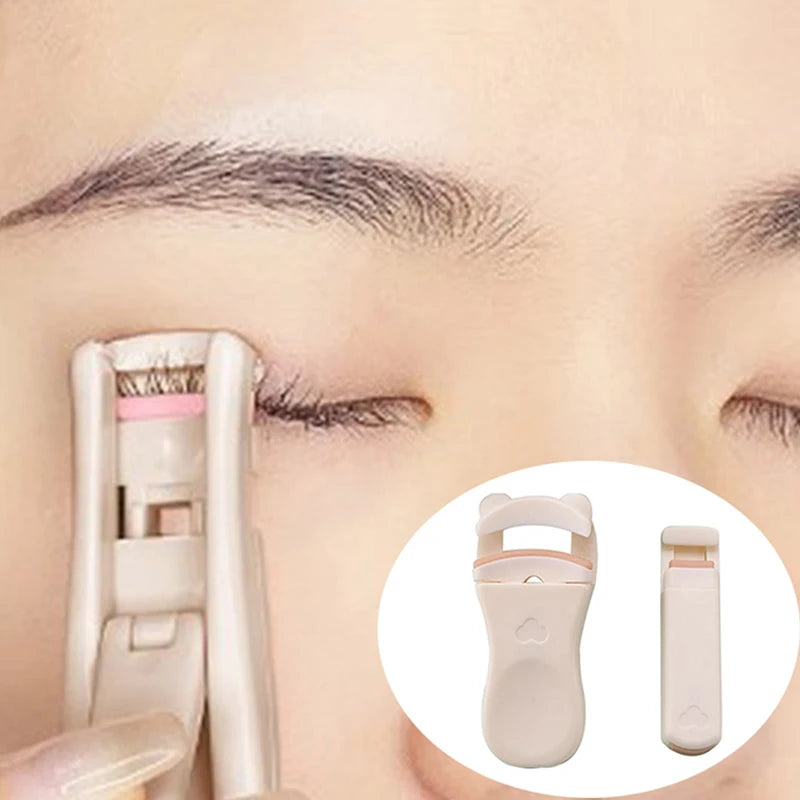 A close-up of a person using a white eyelash curler on their eye, with an inset showing the curler and its components.