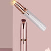 A pink electric eyebrow trimmer is shown with a close-up of the trimming tip and the full product body.