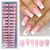 A set of luxury nude pink ballet length false fingernails displayed in a clear plastic case.