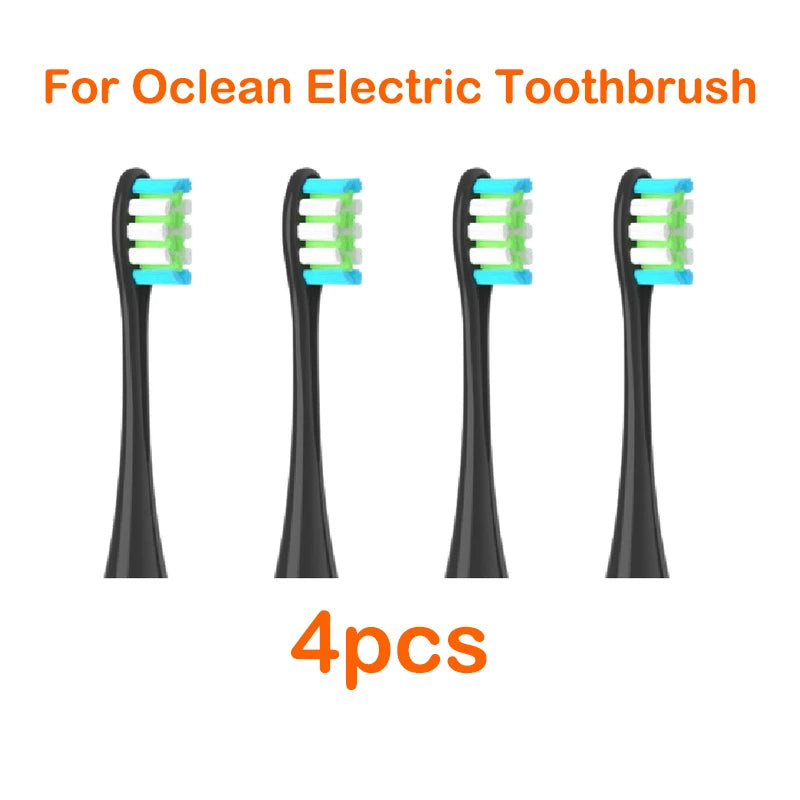 Four replacement brush heads for an Ocean electric toothbrush are shown.