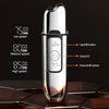 A silver reciprocating electric shaver with buttons for low, medium, and high speed settings is shown on a dark surface.
