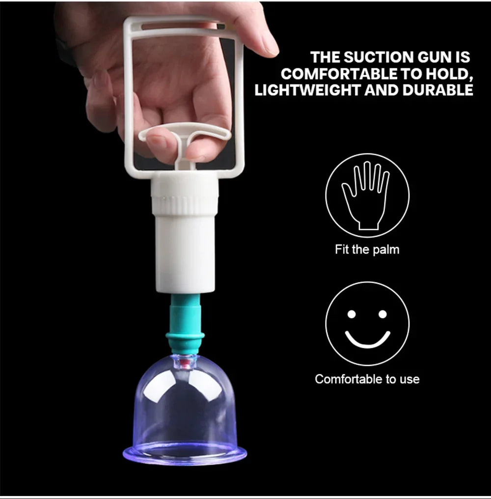 Une main tient un dispositif à ventouse avec une tasse en verre transparent pour la thérapie par cupping au vide professionne