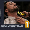 A man is using a yellow electric foil shaver on his neck while shaving.