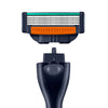 A precision replacement razor blade head assembly featuring a green and silver blade with an orange lubricating strip and a d