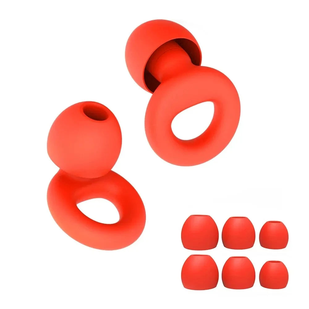 A set of red silicone earplugs for noise reduction, shown in various stages of opening.