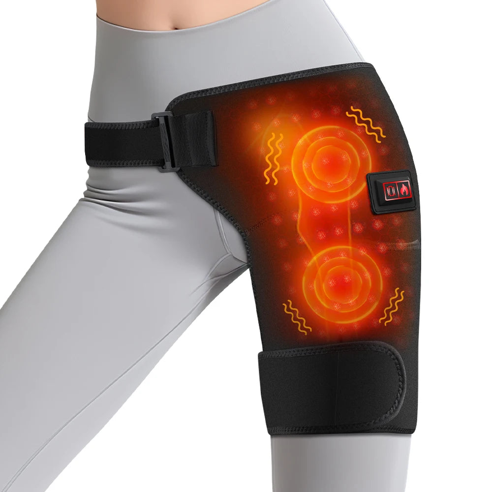 A black infrared heat and vibration hip massager belt worn on a person's thigh.