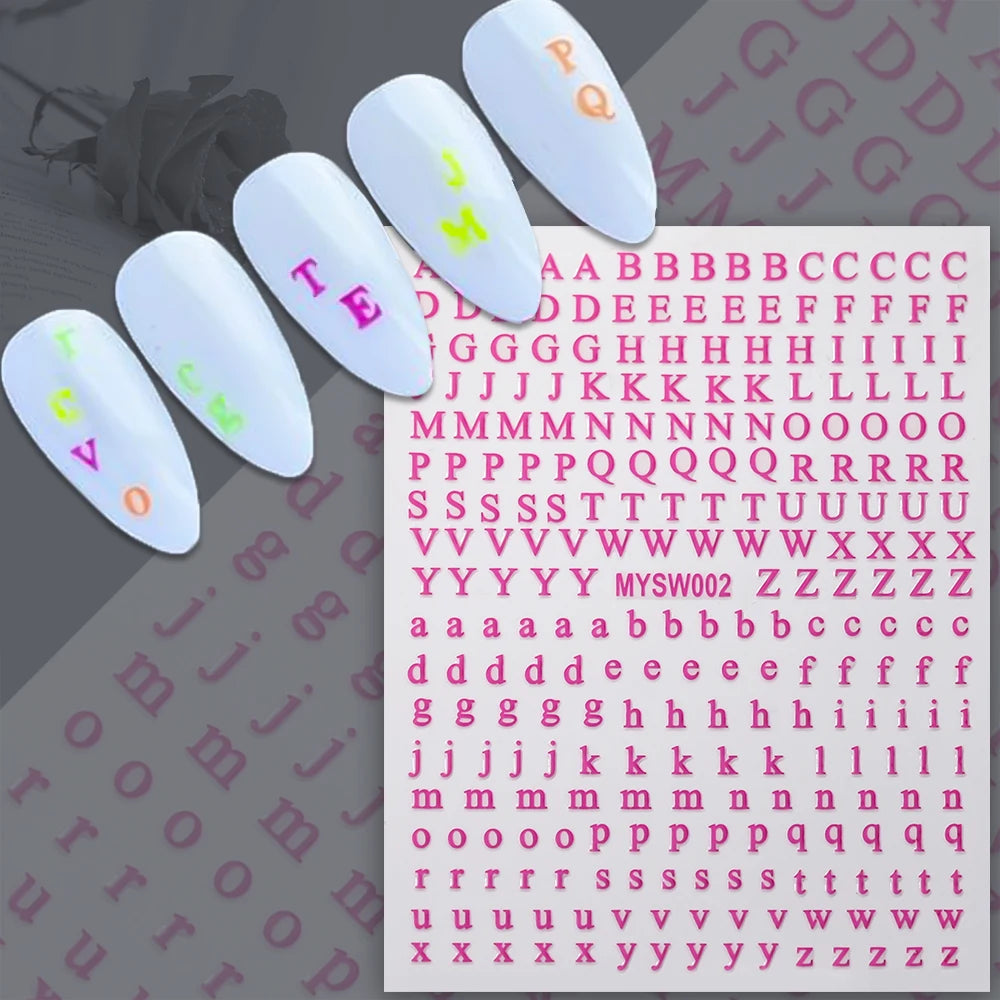 A collection of laser gold and silver 3D alphabet nail art stickers featuring various letters and symbols.