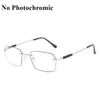 A pair of clear photochromic reading glasses with silver frames and black accents.