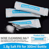 Packets of Nasal Rinse Mix salt for nasal irrigation shown next to a measurement guide.