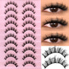 A collection of pink and black wispy cat eye false eyelashes displayed in various styles.