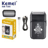 A black Kemei KM-T366 electric beard shaver and trimmer with a charging cable and grooming kit.