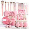 A pink set of 40 professional makeup brushes and sponges for beauty needs