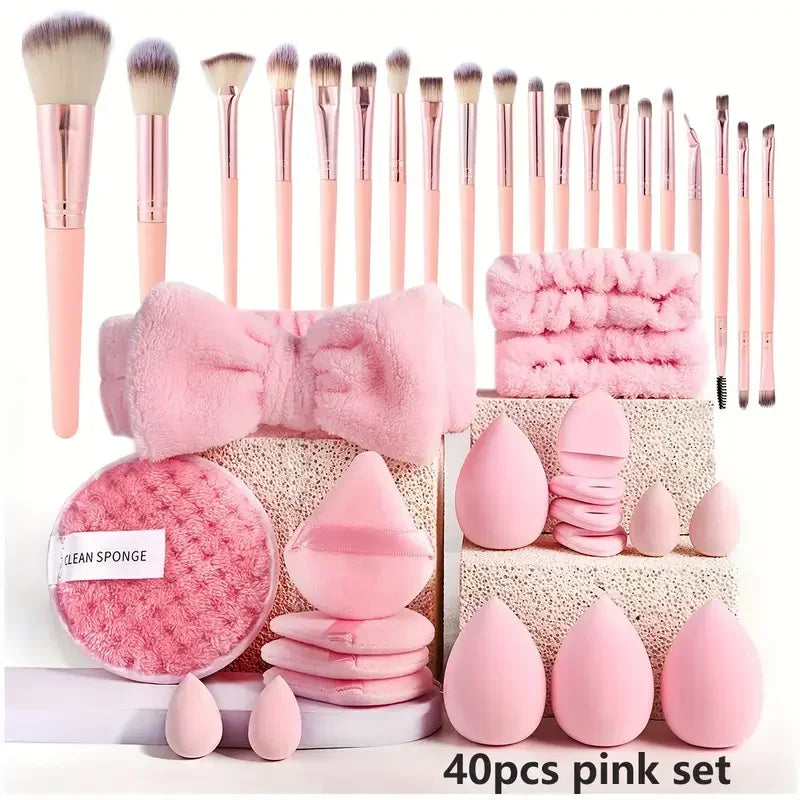 A pink set of 40 professional makeup brushes and sponges for beauty needs