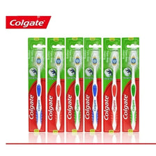 A pack of six Colgate soft bristle toothbrushes in green packaging.