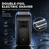 A black double-foil electric shaver is shown against a dark, wet background with glowing blue accents.