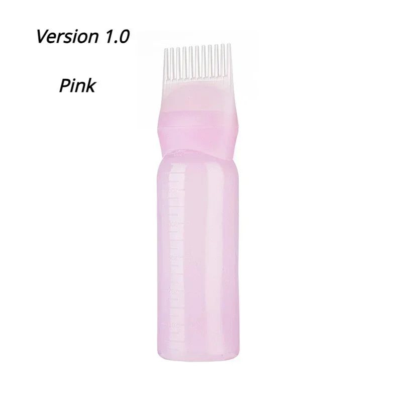 Peigne applicateur de teinture capillaire en silicone rose avec un corps translucide rose.