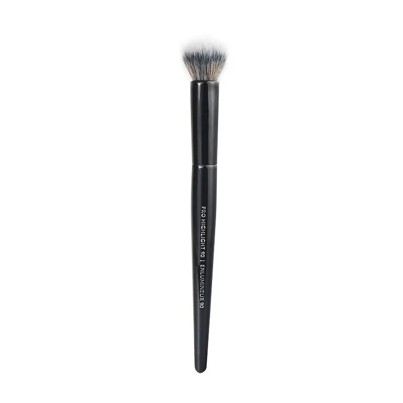 A black professional makeup brush set used for contouring and highlighting.
