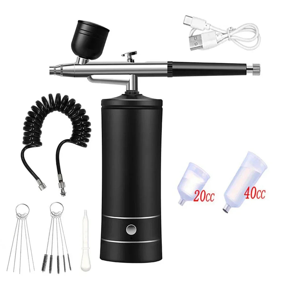 A portable airbrush kit for nail art and craft painting showing the airbrush, tubing, and various paint colors.
