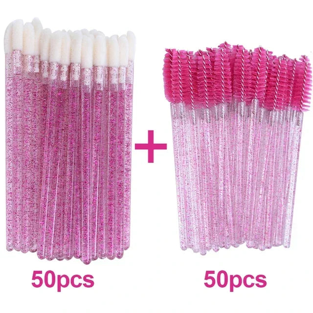 A set of 100 disposable pink eyelash and eyebrow brushes, packaged in two groups of 50.