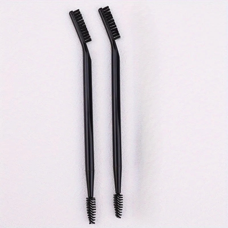 A pair of black dual-ended eyelash curlers and a brow brush set displayed against a white background.