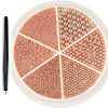 A circular display of gold mixed stainless steel bead nail art decorations arranged in radial sections.