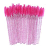 A set of pink disposable eyelash and eyebrow brushes