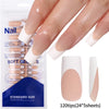 A hand displays nude pink matte French press on nails packaged with 120 tips in 24 sheets.