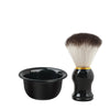 A black professional shaving kit featuring a bowl and stand with a brush.