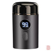 A black electric shaver with a silver trim and a digital display showing 99.