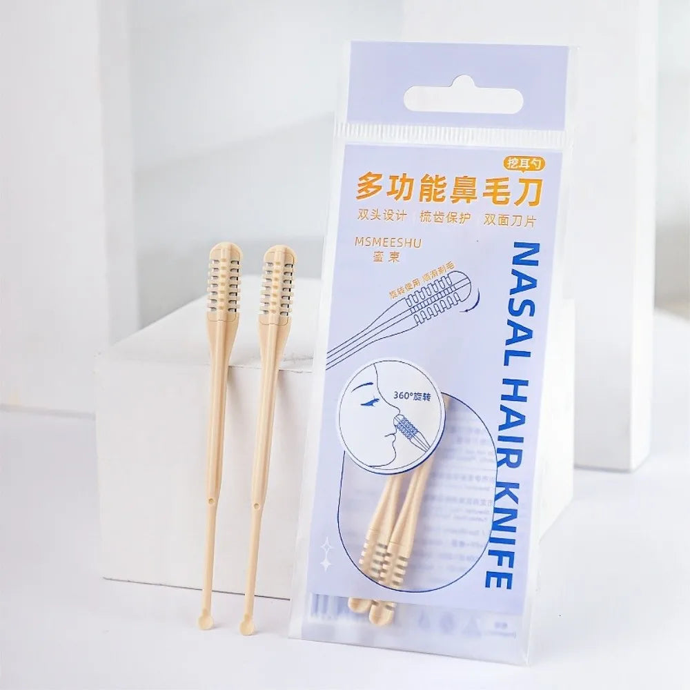 A set of three wooden nasal and ear hair knives packaged in a clear plastic pouch.