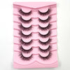 Plateau en plastique rose contenant plusieurs rangées de faux cils de renard dramatiques pour application.