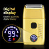 A gold electric hair clipper with a digital display showing 99% load and turbo mode.