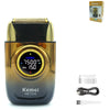 A Kemel KM-T228 professional cordless electric shaver in black and gold with accessories.