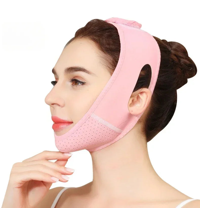 A woman wearing a pink V-Line face shaping strap for jawline and double chin treatment.