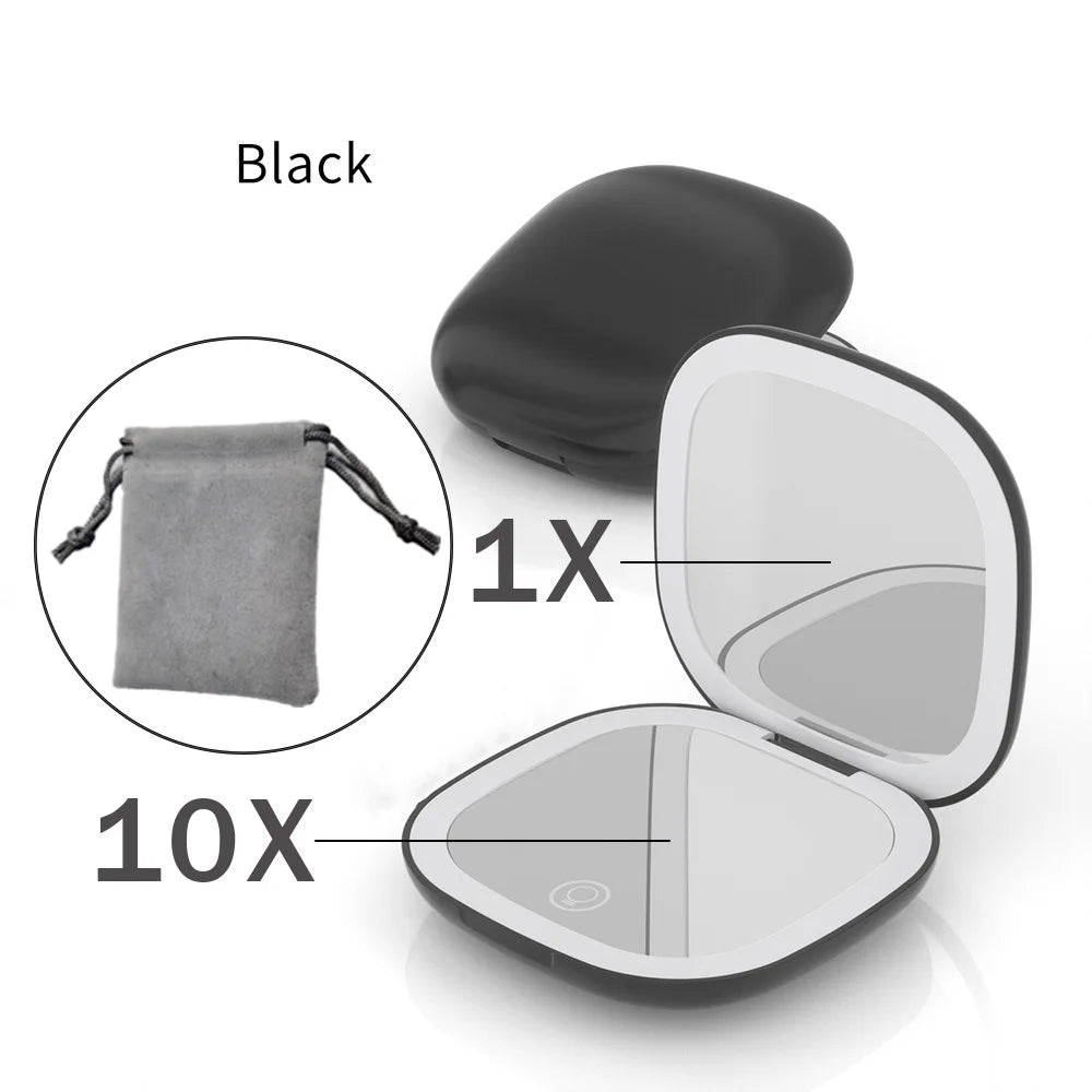 A black compact LED makeup mirror showing 1X and 10X magnification options.