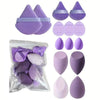 A set of purple and pink makeup sponges and applicators for professional use.