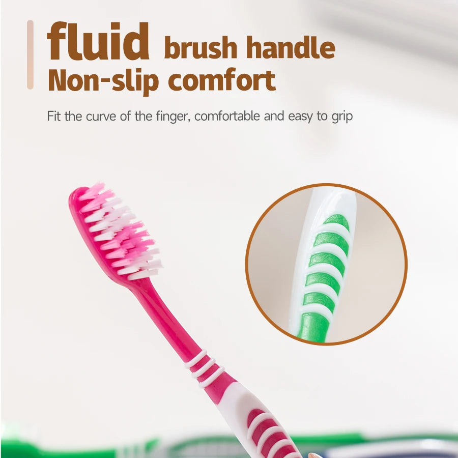 Manche de pince rose et blanc avec gros plan sur les poils, mettant en valeur son design fluide et antidérapant.