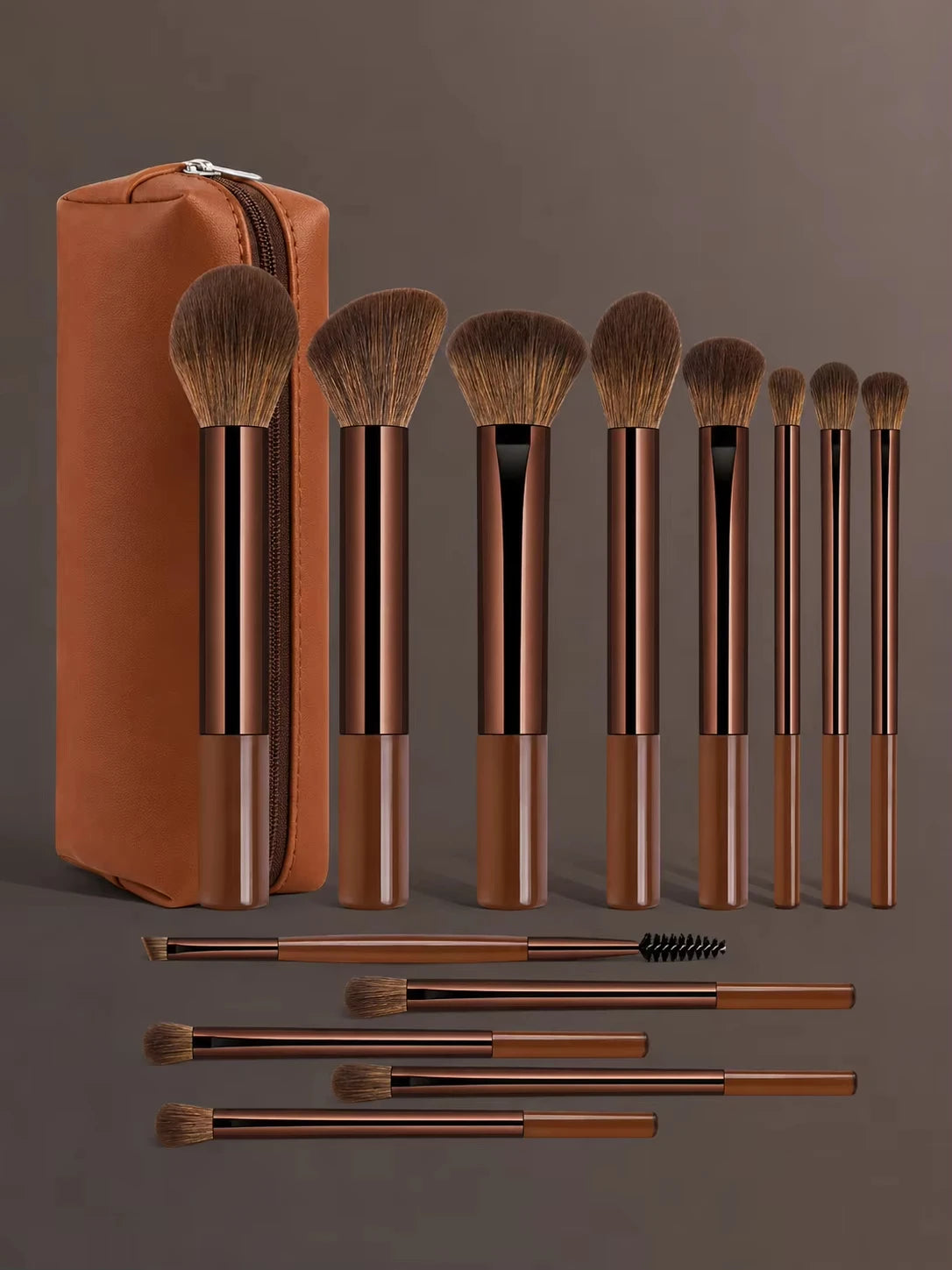 A set of 14 professional makeup brushes and sponges in a brown leather case and various wood-colored handles.