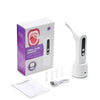 White precision tonsil stone remover device with a purple box and instruction manual.