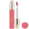 A tube of liquid bronzer contour foundation stick in pink packaging with a metallic applicator and a round product pan.