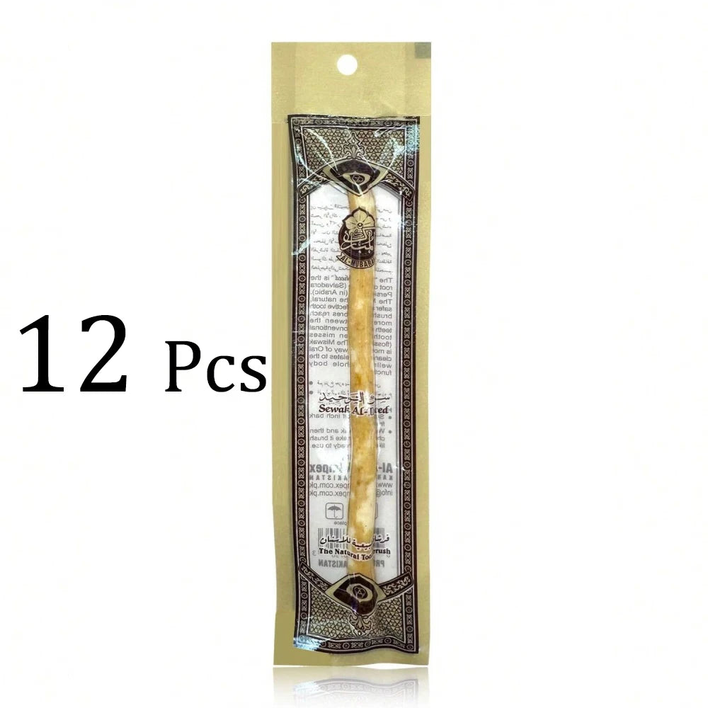 A package containing 12 traditional wooden miswak toothbrushes in a clear plastic pouch.