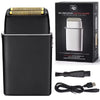 A black professional rechargeable electric shaver set including the shaver head, foil, and charging cable.